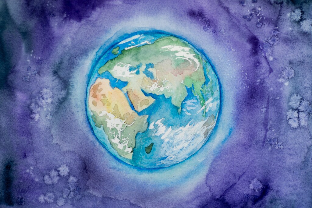 a painting of the earth to represent countries coming together at COP26.