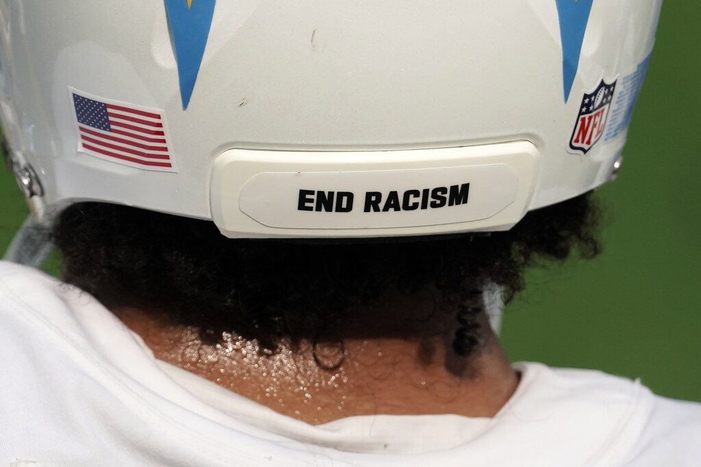 Sep 27, 2020; Inglewood, California, USA; Los Angeles Chargers linebacker Emeke Egbule (51) wears the words End Racism on the back of his helmet against the Carolina Panthers at SoFi Stadium. The Panthers defeated the Chargers 21-16. Mandatory Credit: Kirby Lee-USA TODAY Sports - 14993078