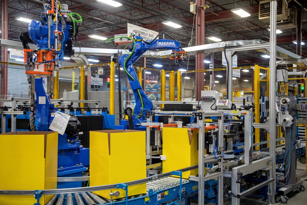 an automated packing line at Promation, a robotics engineering and automation manufacturing firm in Oakville, Ontario, Canada