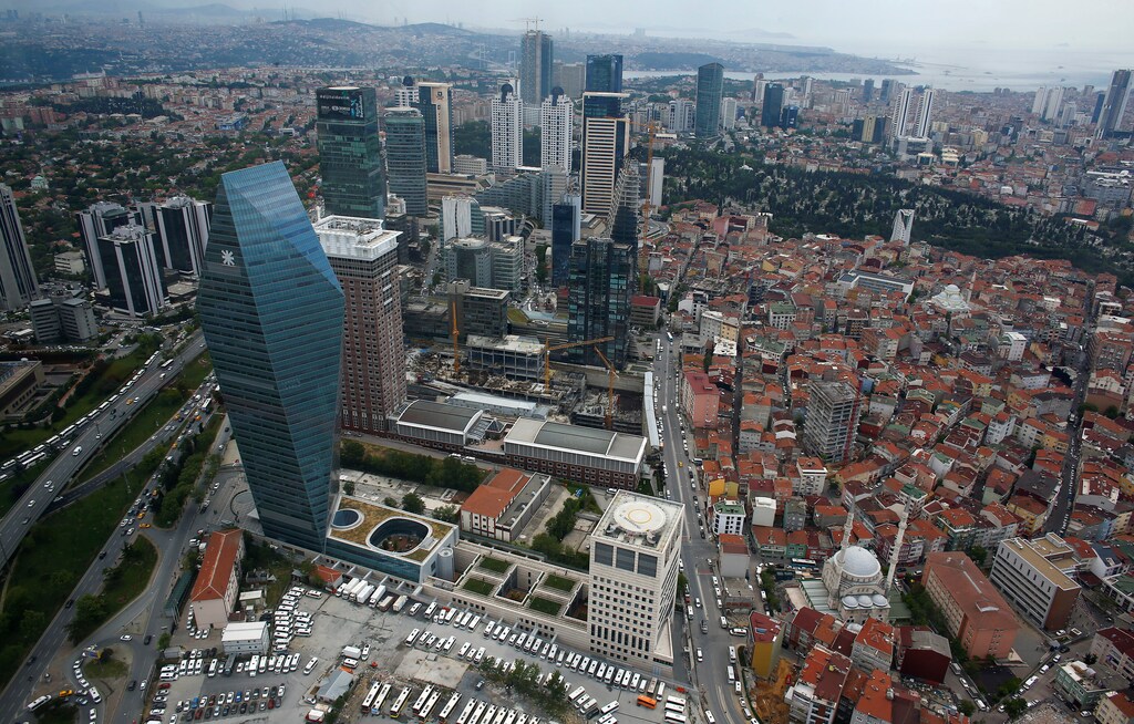 Bussiness and financial district of Levent, which comprises of leading Turkish companies' headquarters and popular shopping malls, is seen from the Sapphire Tower in Istanbul, Turkey May 3, 2016. Picture taken through a window. REUTERS/Murad Sezer - RTX2CQAP