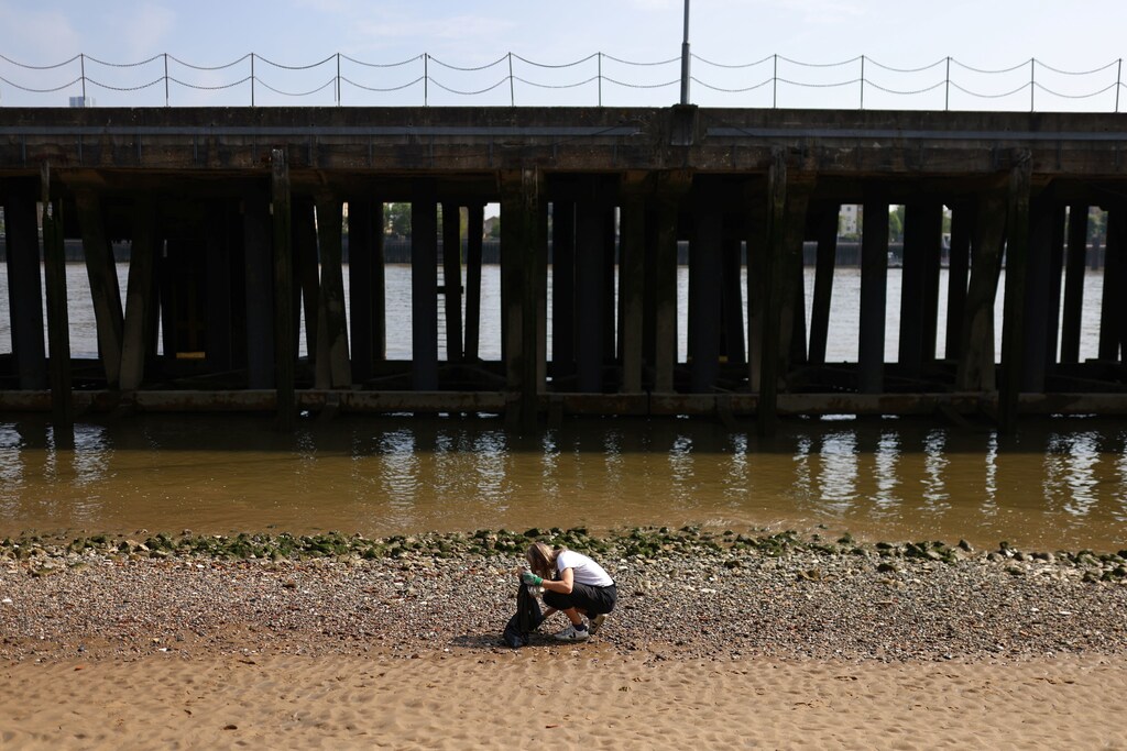 Flora Blathwayt, founder of Washed Up Cards, collects plastics found washed up on the banks of the river Thames.
