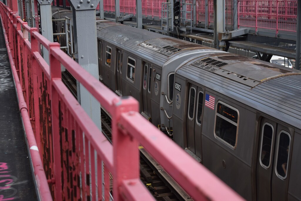 Trains and a bridge showing urban infrastructure.