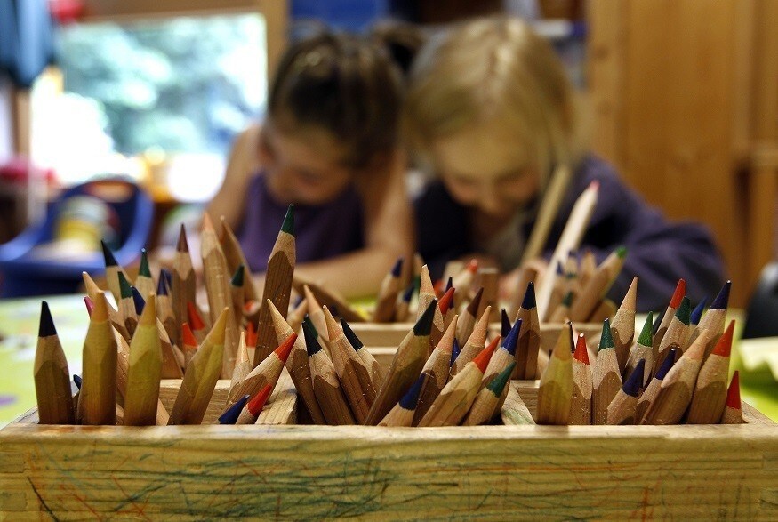 Coloured pencils are pictured in a wooden box at a nursery school in Eichenau near Munich June 18, 2012. REUTERS/Michaela Rehle (GERMANY - Tags: EDUCATION SOCIETY) - RTR33VKH