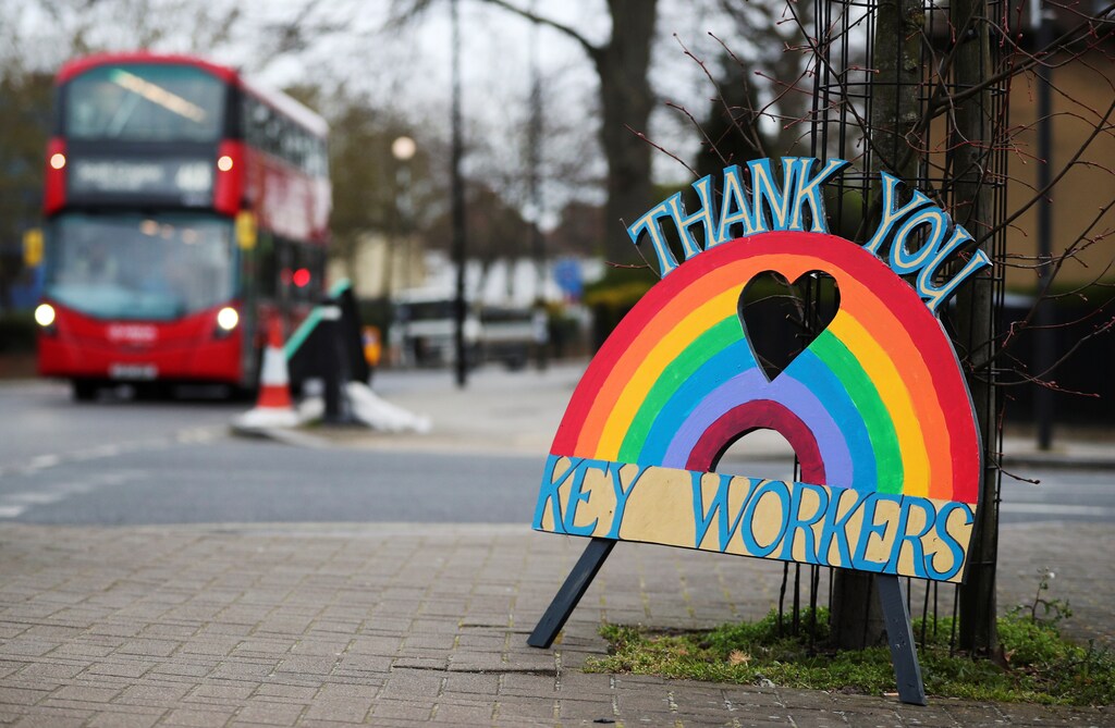 A sign thanking key workers is seen, as the spread of the coronavirus disease (COVID-19) continues, in Herne Hill, London, Britain March 30, 2020. REUTERS/Hannah McKay - RC26UF93M9AU