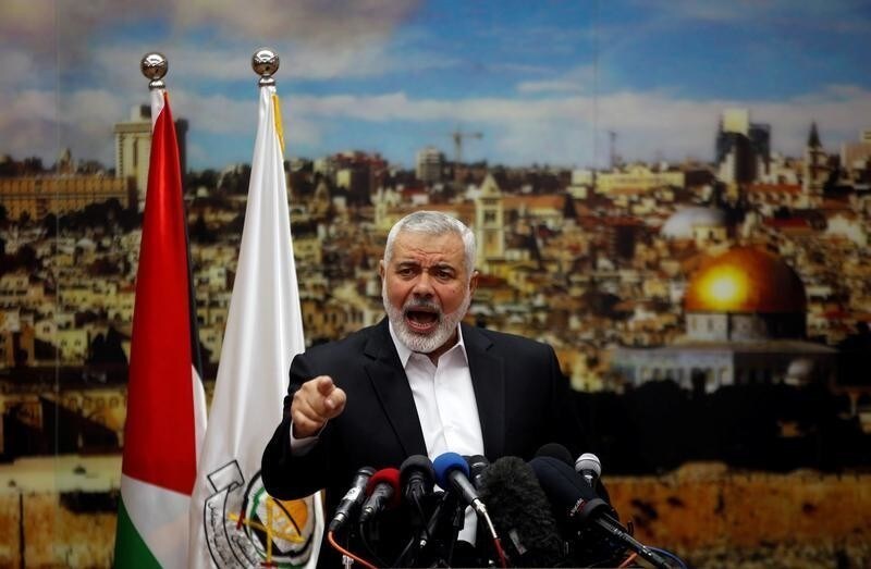 Hamas Chief Ismail Haniyeh gestures as he delivers a speech over U.S. President Donald Trump's decision to recognize Jerusalem as the capital of Israel, in Gaza City December 7, 2017. REUTERS/Mohammed Salem - RC17A999FFD0