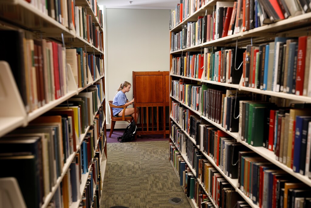 A student works at a cubicle in a library on the campus of the University of North Carolina at Chapel Hill, North Carolina, U.S., September 20, 2018. Picture taken on September 20, 2018. REUTERS/Jonathan Drake - RC15C703D5C0