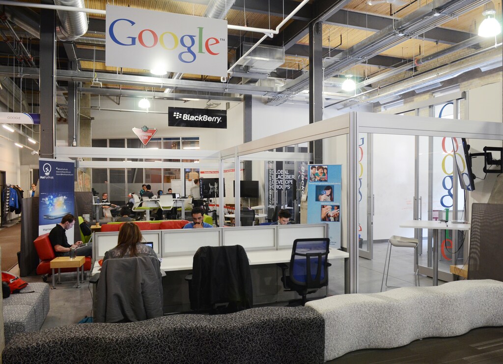 Major technology companies like Google and BlackBerry provide mentoring services to companies within Communitech in Kitchener's historic Tannery District in Kitchener, Ontario, March 18, 2014. Kitchener, historically the blue-collar twin to the university city of Waterloo, is today home to chic offices such as the Communitech building - a converted brick structure in the the historic Tannery District, adorned with modern art, which acts as an unofficial clubhouse for many small tech companies. Picture taken March 18, 2014. REUTERS/Euan Rocha (CANADA - Tags: EDUCATION SCIENCE TECHNOLOGY BUSINESS) - RTR3LJYG