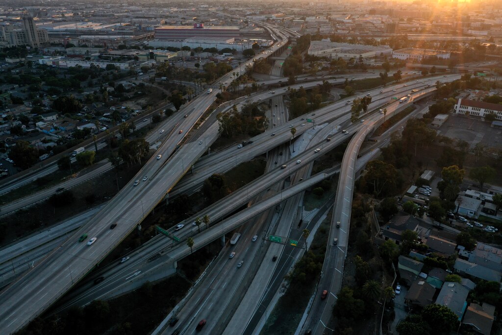 An aerial view shows traffic on the East Los Angeles Interchange complex, the busiest freeway interchange in the world, in Los Angeles, California, U.S. August 10, 2021. Interstate 5 (I-5), Interstate 10 (I-10), U.S. Route 101 (US 101), and State Route 60 (SR 60) all converge at the East Los Angeles Interchange. Picture taken with a drone. REUTERS/Bing Guan - RC2J2P9AMJ60