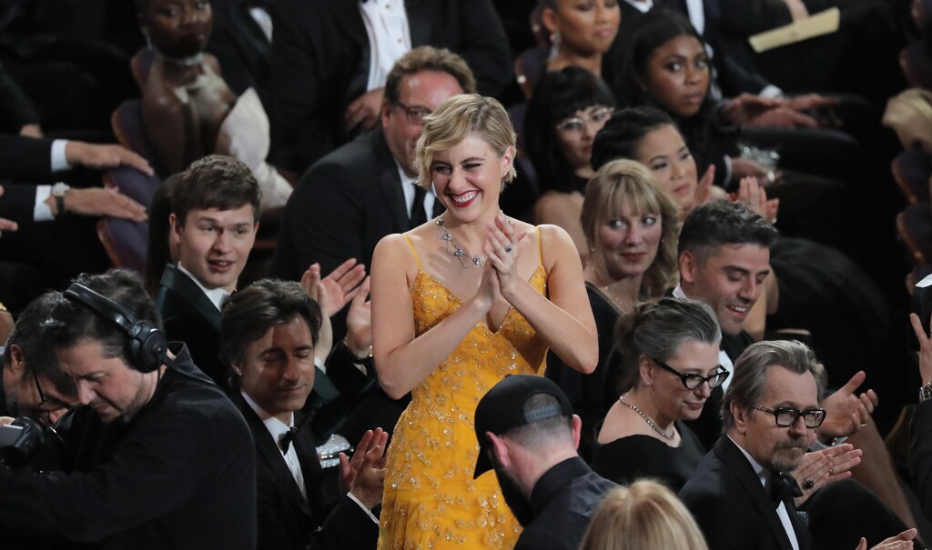 90th Academy Awards - Oscars Show - Hollywood, California, U.S., 04/03/2018 - Greta Gerwig reacts as Guillermo del Toro is announced as Best Director for "The Shape of Water." REUTERS/Lucas Jackson - HP1EE350BXZ52