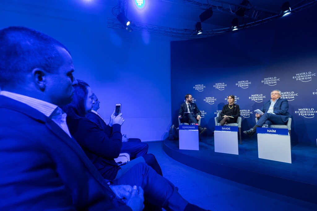 The panel Moisés Naím, Distinguished Fellow, Carnegie Endowment for International Peace, USA, Gabriela Saade, Researcher and Project Coordinator, La Mejor Venezuela Foro, Venezuela, moderated by Jonathan Tepperman, Editor-in-Chief, Foreign Policy Group, USA, speaking during the Session "Mapping Paths to Stability in Venezuela" at the Annual Meeting 2019 of the World Economic Forum in Davos, January 24, 2019. Congress Centre - Situation RoomCopyright by World Economic Forum / Ciaran McCrickard