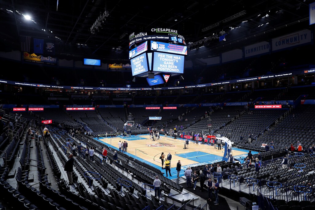 Mar 11, 2020; Oklahoma City, Oklahoma, USA; Fan leave after an announcement that the Oklahoma City Thunder vs. Utah Jazz game is canceled just before the tip off at Chesapeake Energy Arena. Mandatory Credit: Alonzo Adams-USA TODAY Sports