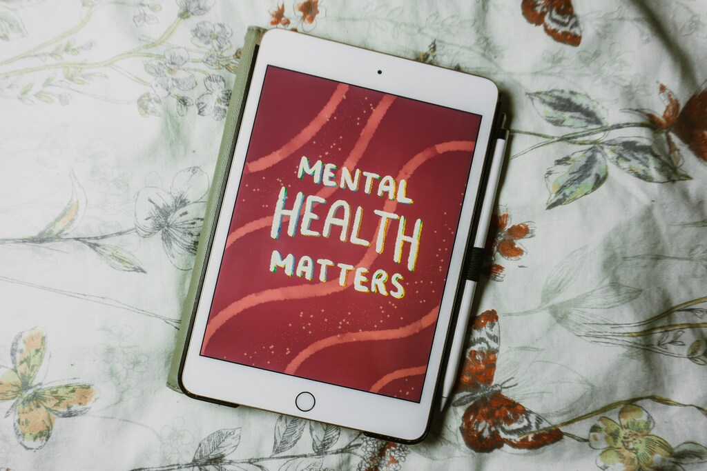 "mental health matters" illustrated on a tablet.