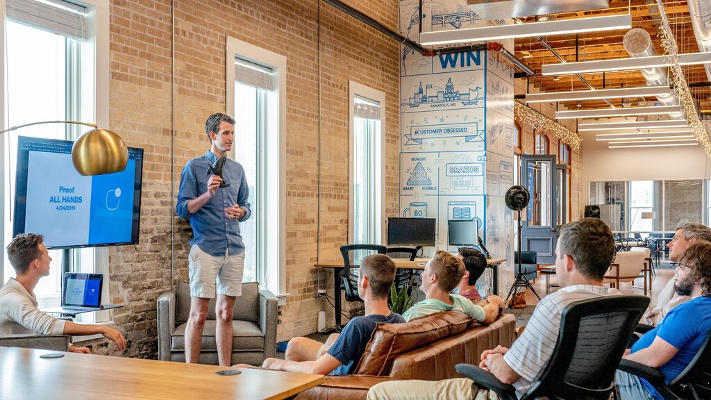 A group of people in a meeting.