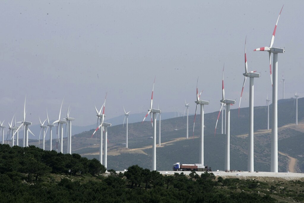 Wind turbines are pictured at the wind farm of "Dahr Saadane", in Tangiers June 28, 2010. Morocco is one of the world's most energy-poor countries, importing around 95 percent of its needs, according to the World Bank. Energy imports accounted for more than a quarter of the country's total imports last year, contributing to a 7.9 percent rise in the trade deficit to a record $23.6 billion.