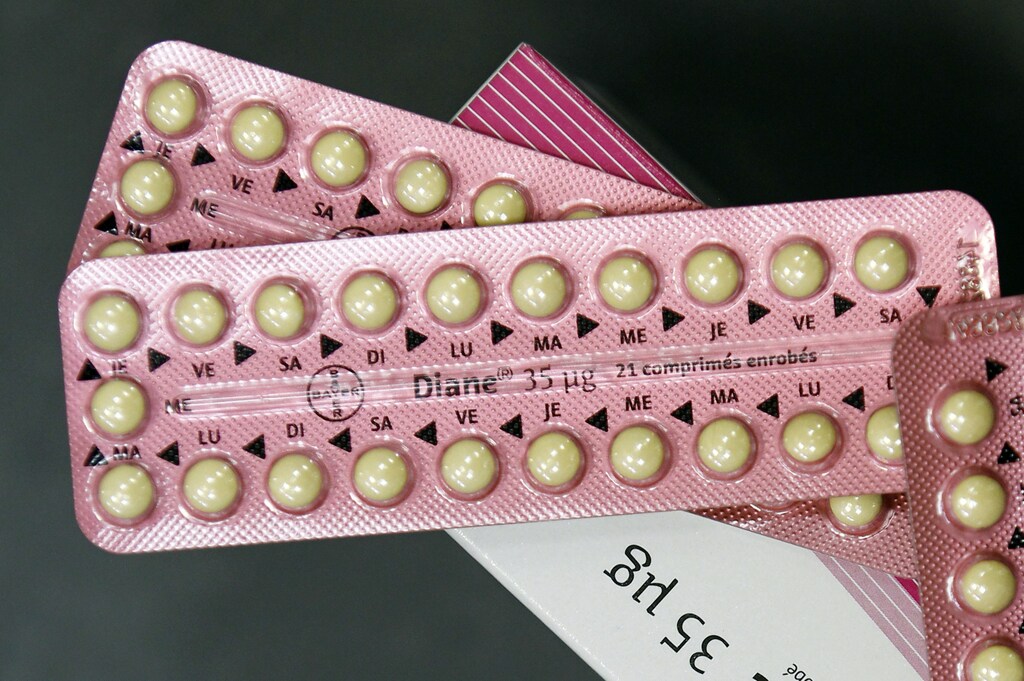 An illustration picture shows blister-packs and a box of acne drug Diane-35, which is also used as a contraceptive, in a pharmacy in Andernos, Southwestern France, January 30, 2013. France's health regulator on Wednesday said it would suspend acne pill Diane 35 and its generic versions within three months because it carries a high risk of blood clots. REUTERS/Regis Duvignau (FRANCE - Tags: HEALTH) - PM1E91U0YUJ01