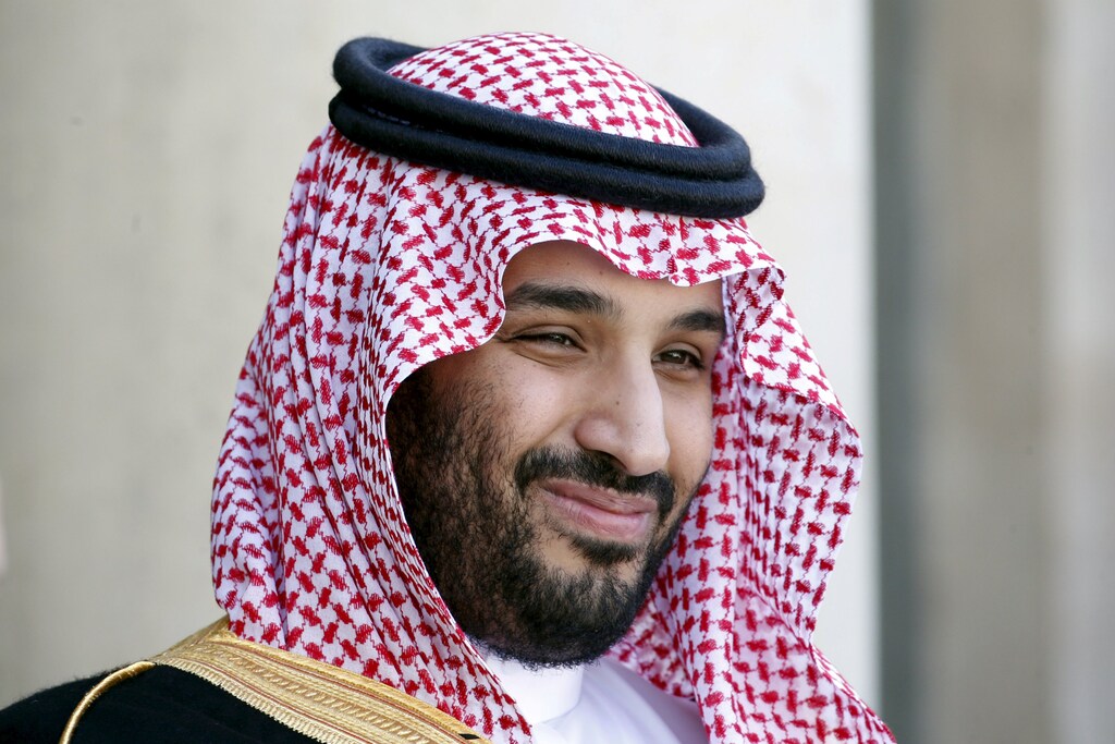 Saudi Arabia's Deputy Crown Prince Mohammed bin Salman reacts upon his arrival at the Elysee Palace in Paris, France, June 24, 2015.