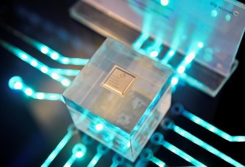 A chip by Huawei's subsidiary HiSilicon is displayed at the Huawei China Eco-Partner Conference in Fuzhou, Fujian province, China March 21, 2019. Picture taken March 21, 2019. REUTERS/Stringer ATTENTION EDITORS - THIS IMAGE WAS PROVIDED BY A THIRD PARTY. CHINA OUT. - RC12DD6EF8E0