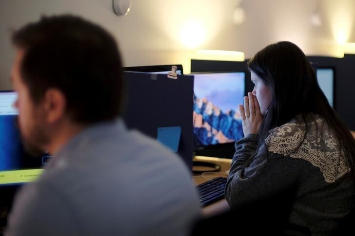 Volunteers on the National Sexual Assault Hotline work both over the phone and via web chat at the offices of the U.S.'s largest anti-sexual violence organization, the Rape Abuse Incest National Network, in Washington, U.S., January 12, 2018. REUTERS/James Lawler Duggan
