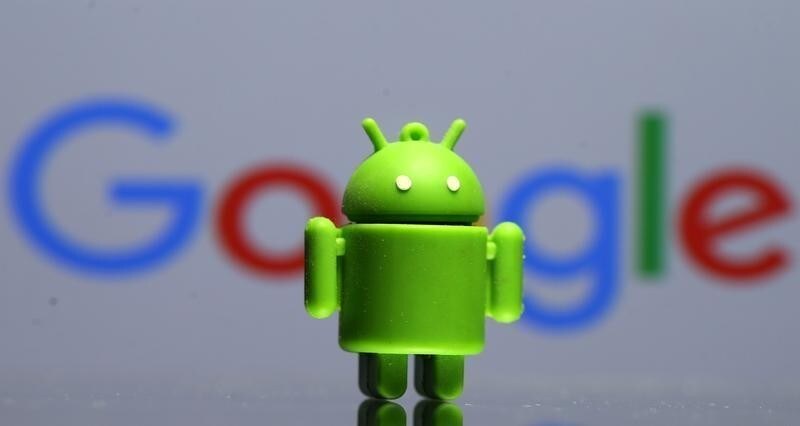 A 3D printed Android mascot Bugdroid is seen in front of a Google logo in this illustration taken July 9, 2017. Picture taken July 9, 2017. REUTERS/Dado Ruvic/Illustration - RC1B112FBA80