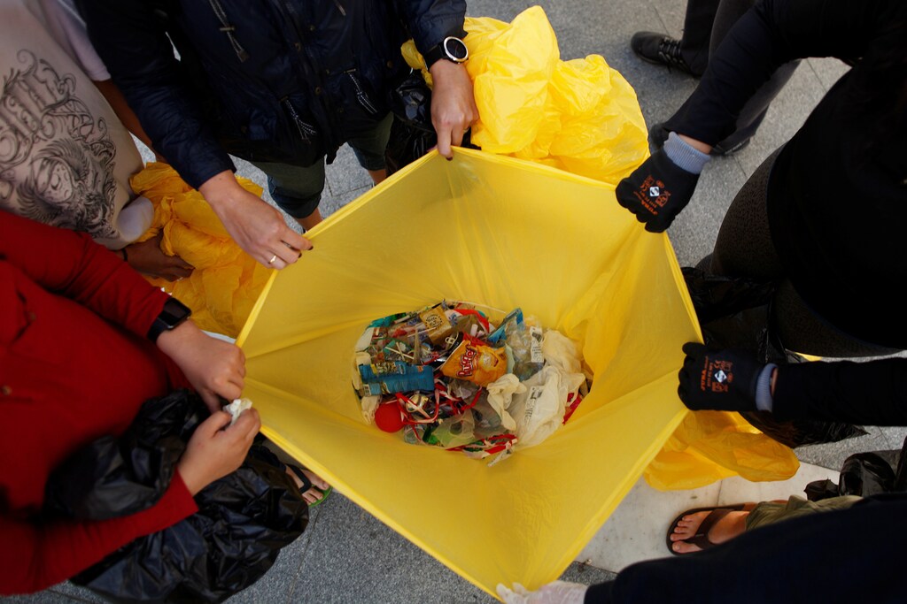 Volunteers show the plastics, after a garbage collection, ahead of World Environment Day on La Costilla Beach, on the coast of the Atlantic Ocean in Rota, Spain June 2, 2018. REUTERS/Jon Nazca