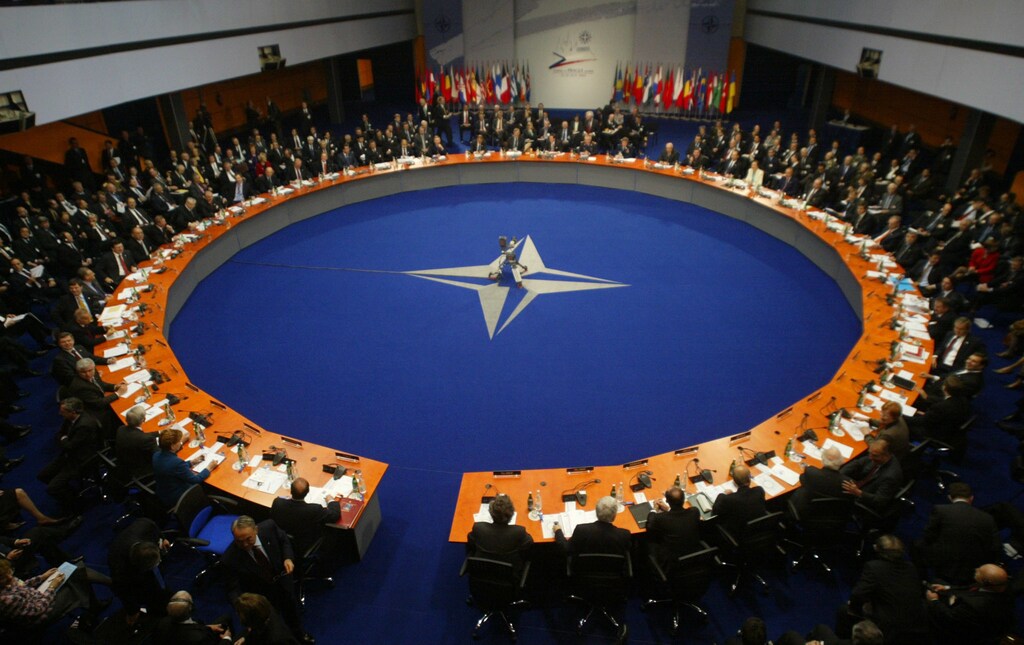 NATO's other partners from Eastern Europe, Central Asia and theCaucasus in the 46-nation Euro-Atlantic Partnership Council gather atthe two-day NATO summit in Prague November 22, 2002. Bush told themembers of the council that they needed to improve their record ondemocracy to advance closer ties with the Western alliance. REUTERS/JoeKlamarWR/AA - RTRE8MS