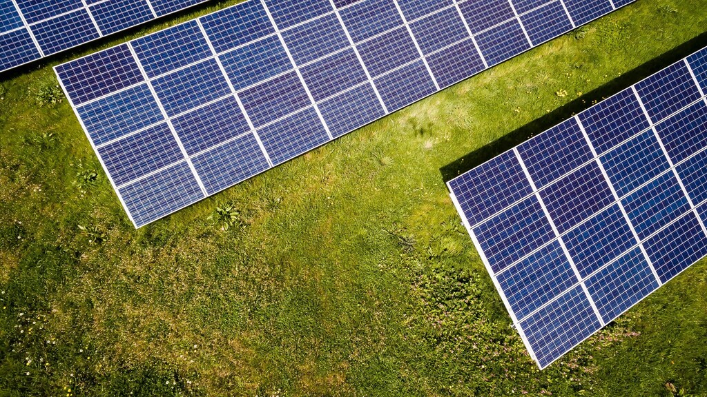 Solar panels on a lawn.