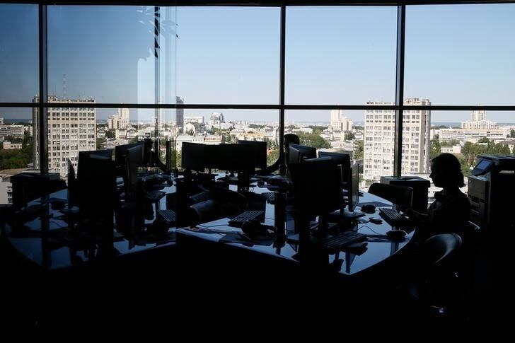 Employees work at an office in Kiev, Ukraine June 4, 2018. REUTERS/Valentyn Ogirenko