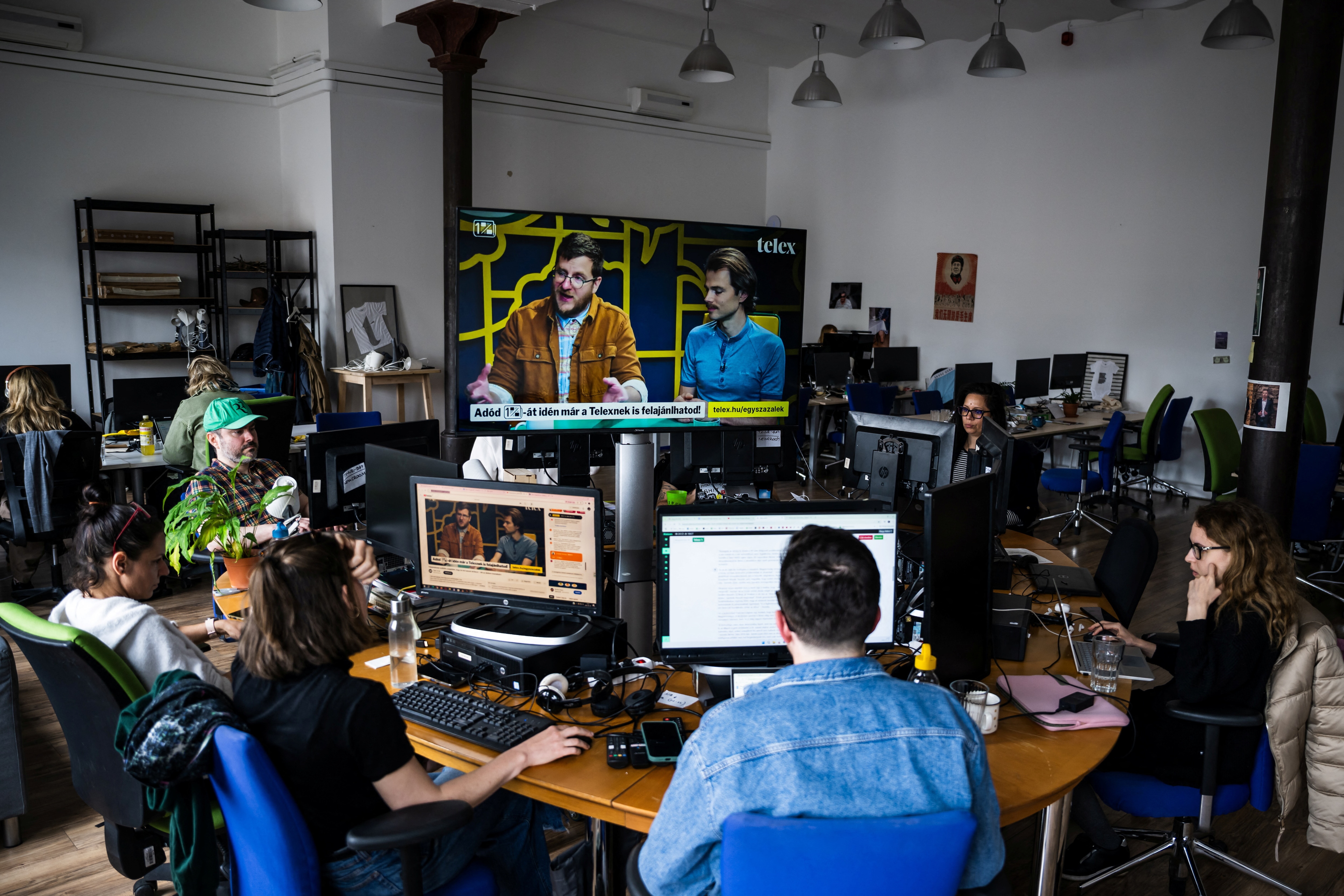 Journalists of the independent news outlet Telex work at their newsroom in Budapest, Hungary, May 19, 2025. REUTERS/Marton Monus