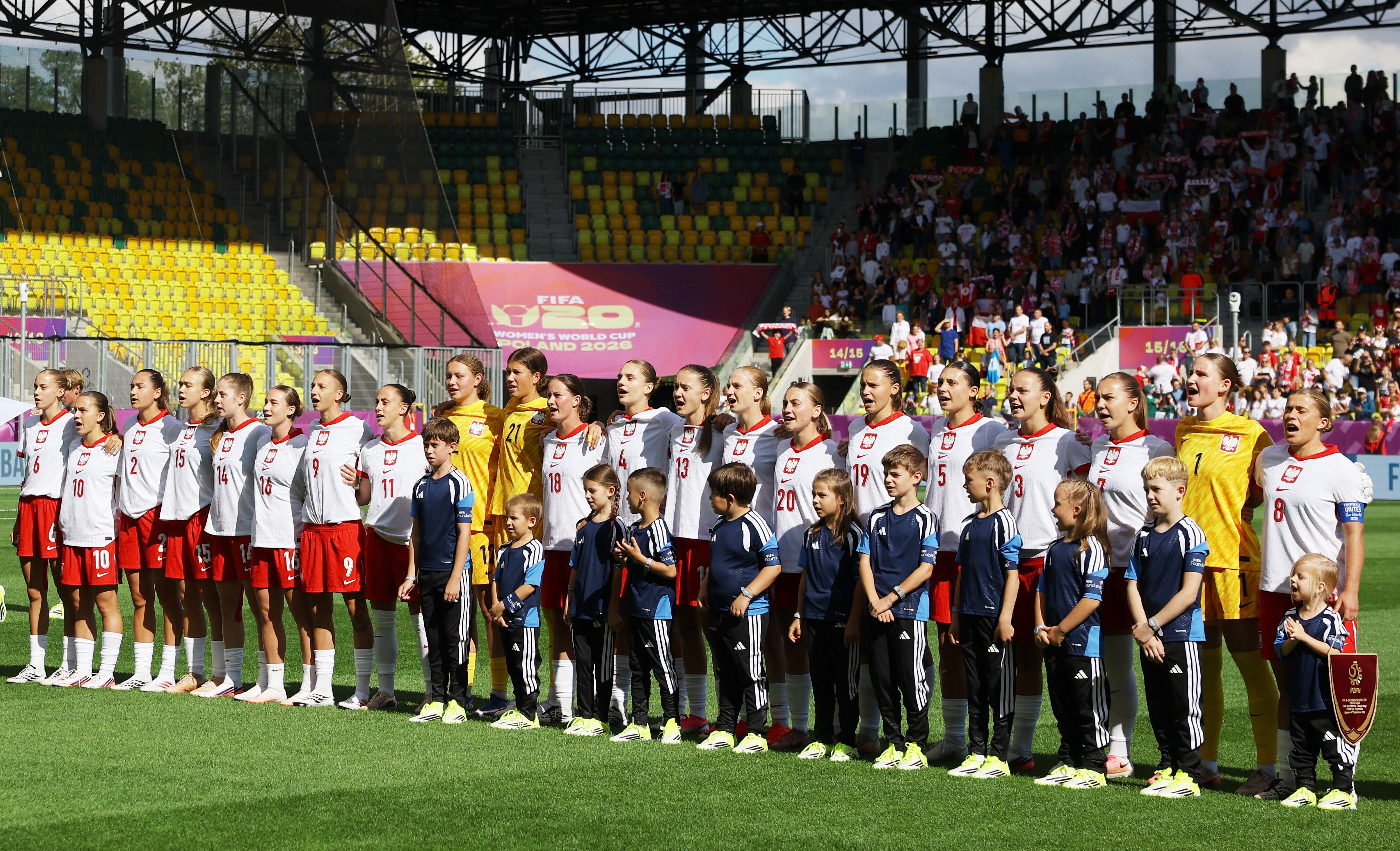 Soccer Football - FIFA Under-20 Women's World Cup - Group A - Poland v Argentina - Arena Katowice, Katowice, Poland - September 5, 2026 Poland players line-up during the national anthem before the match REUTERS/Kacper Pempel