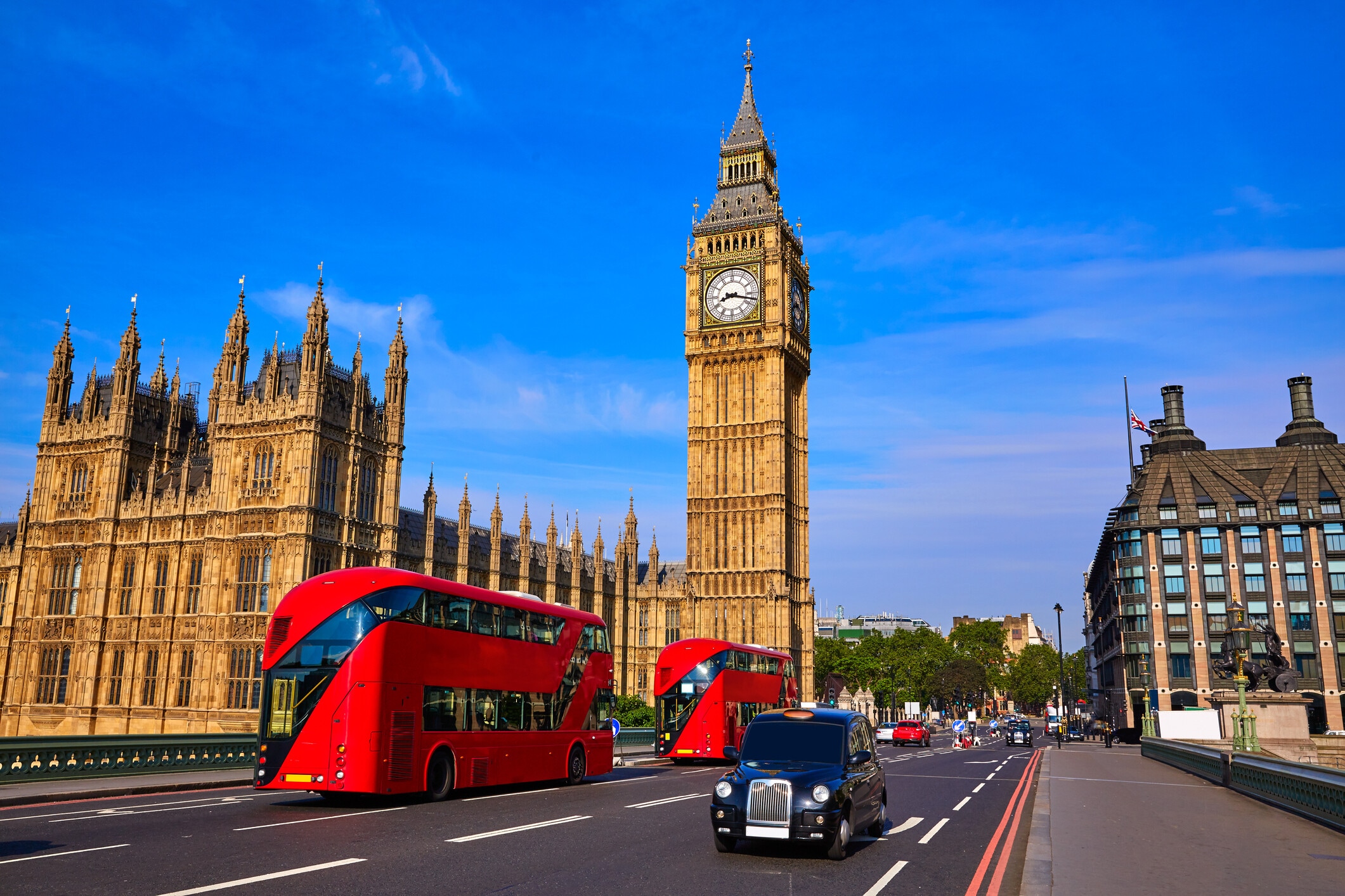 Big Ben Clock Tower and London Bus at England; clean air, electric vehicles