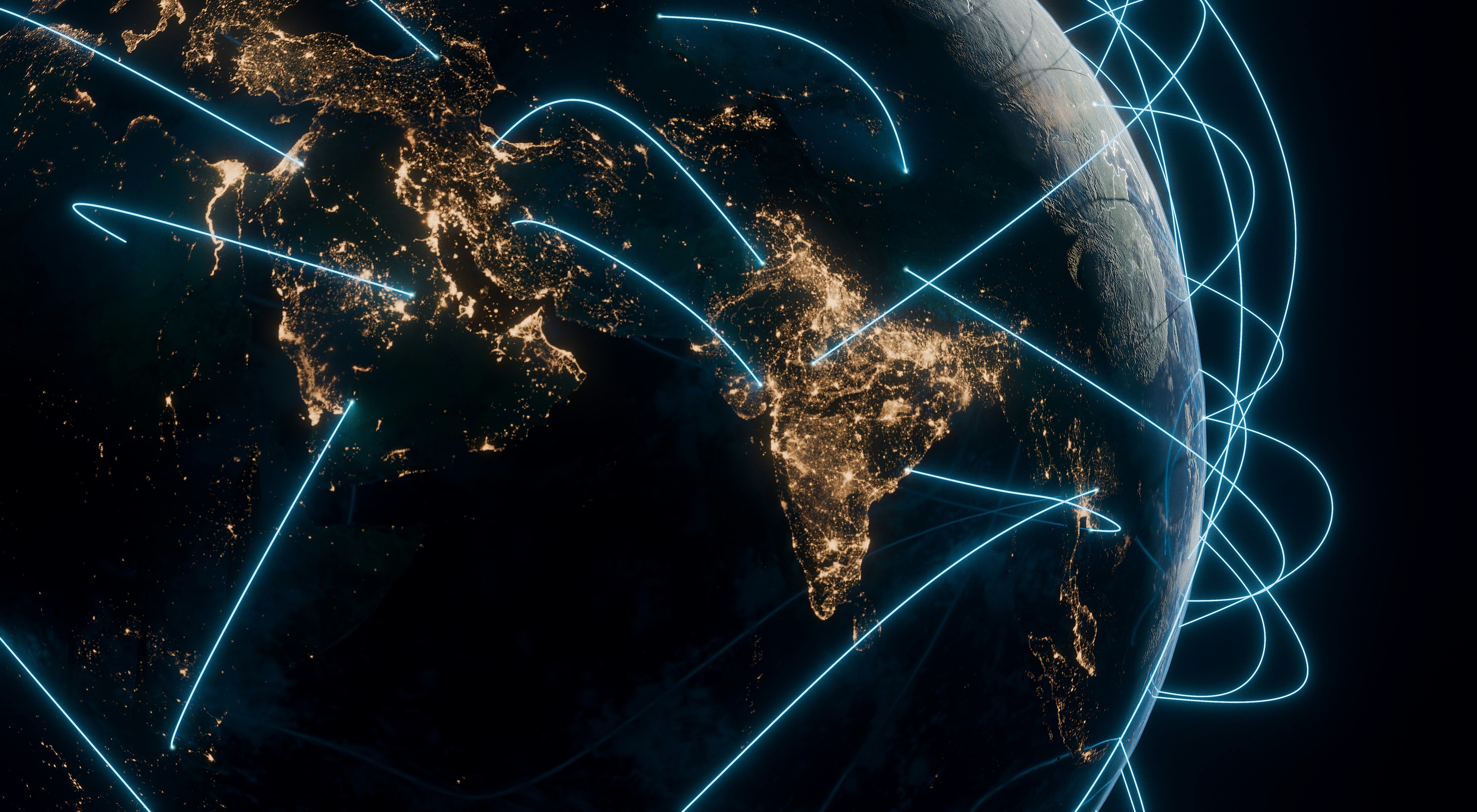 Earth at night with digital lines representing global cooperation.
