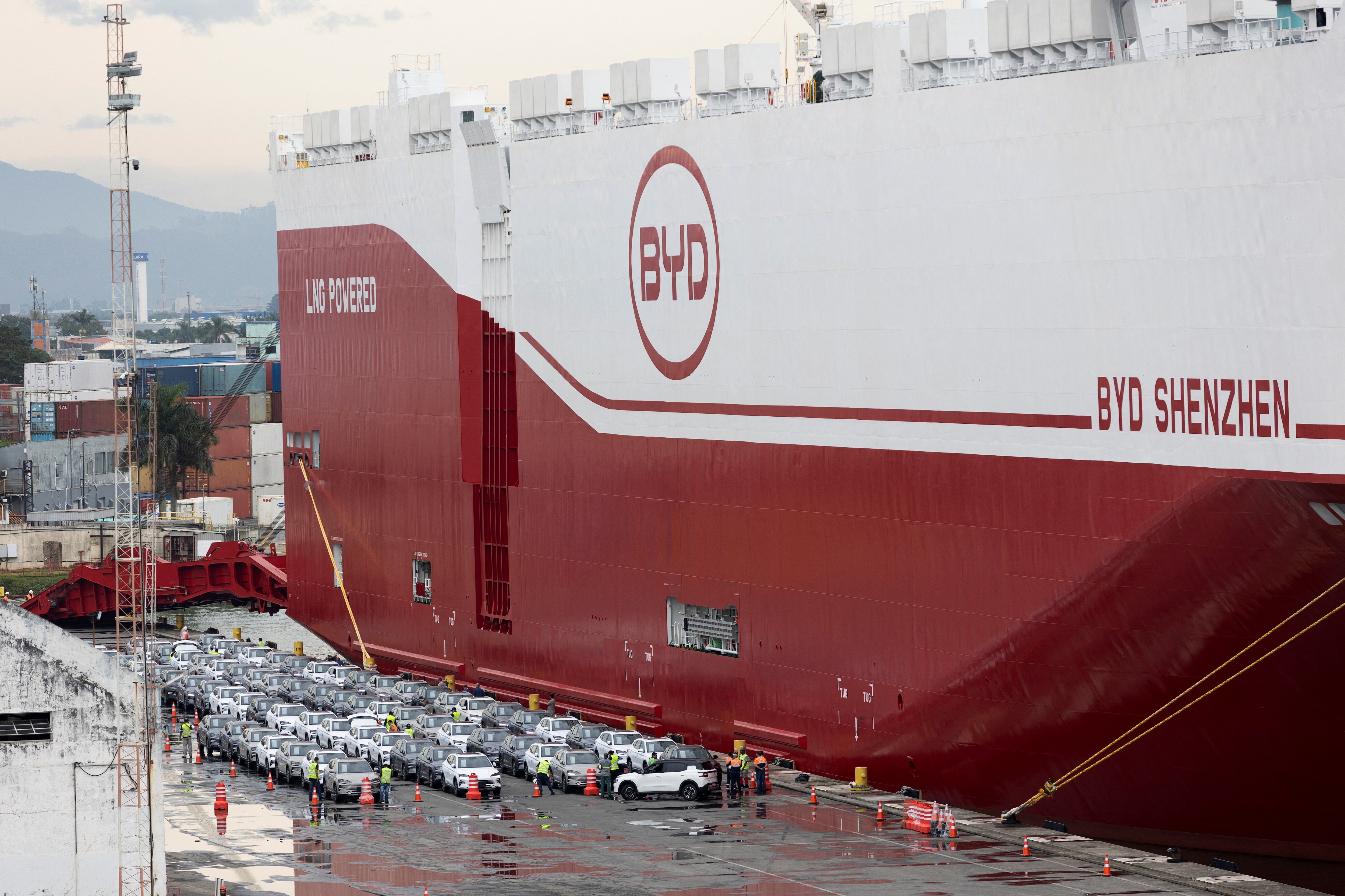 A view shows new electric vehicles after being downloaded from a BYD vessel at the Itajai port in Santa Catarina, Brazil May 28, 2025. REUTERS/Anderson Cohelo