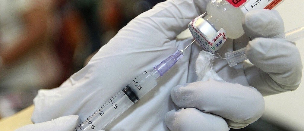 How can we eliminate canine rabies?