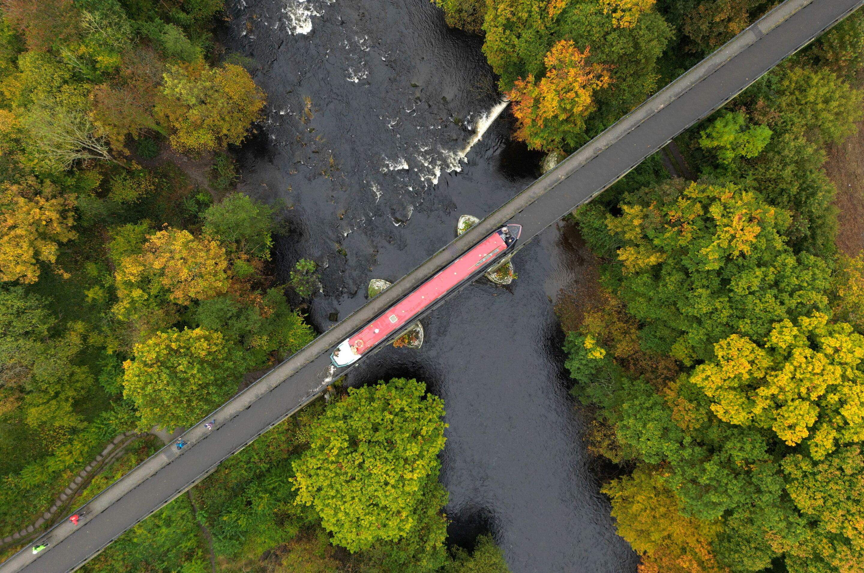 A canal boat crosses the Pontcysyllte Aqueduct in Llangollen, Britain October 15, 2024: Leaders are attempting to reframe investment in water systems.