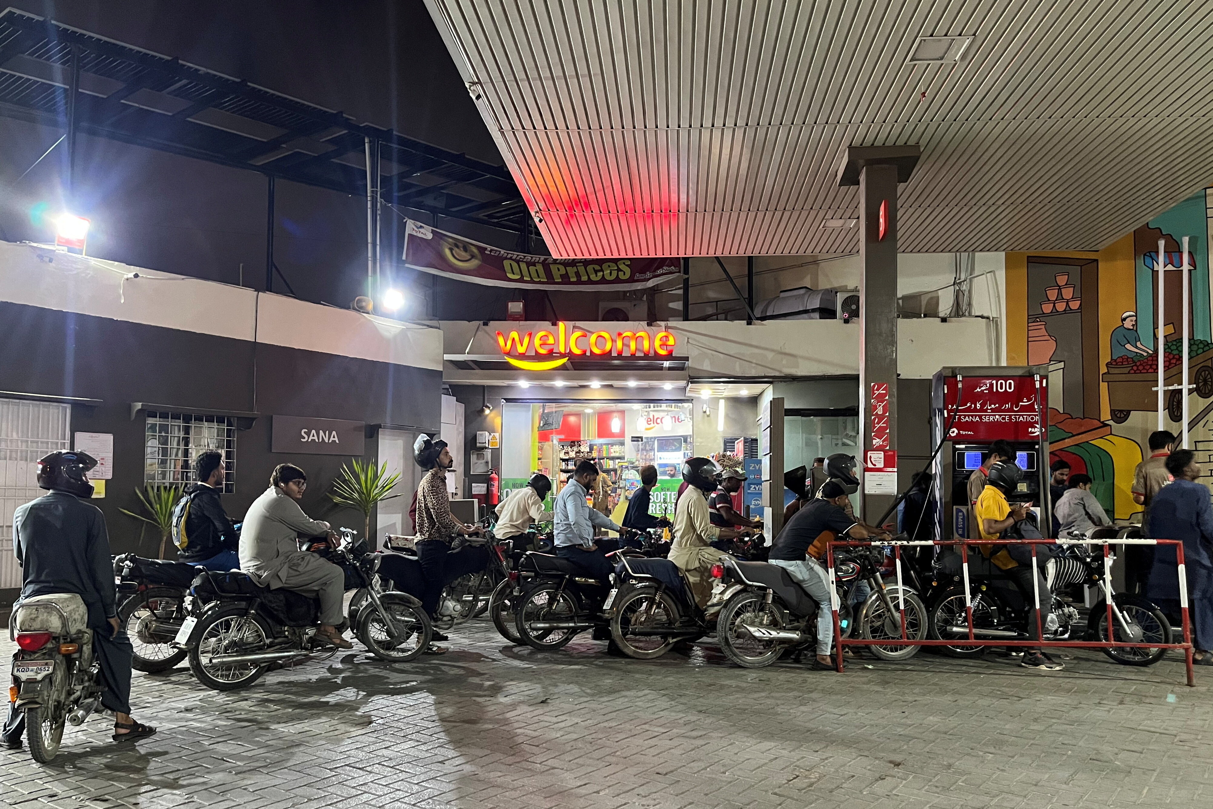People queue for fuel in Karachi, Pakistan.