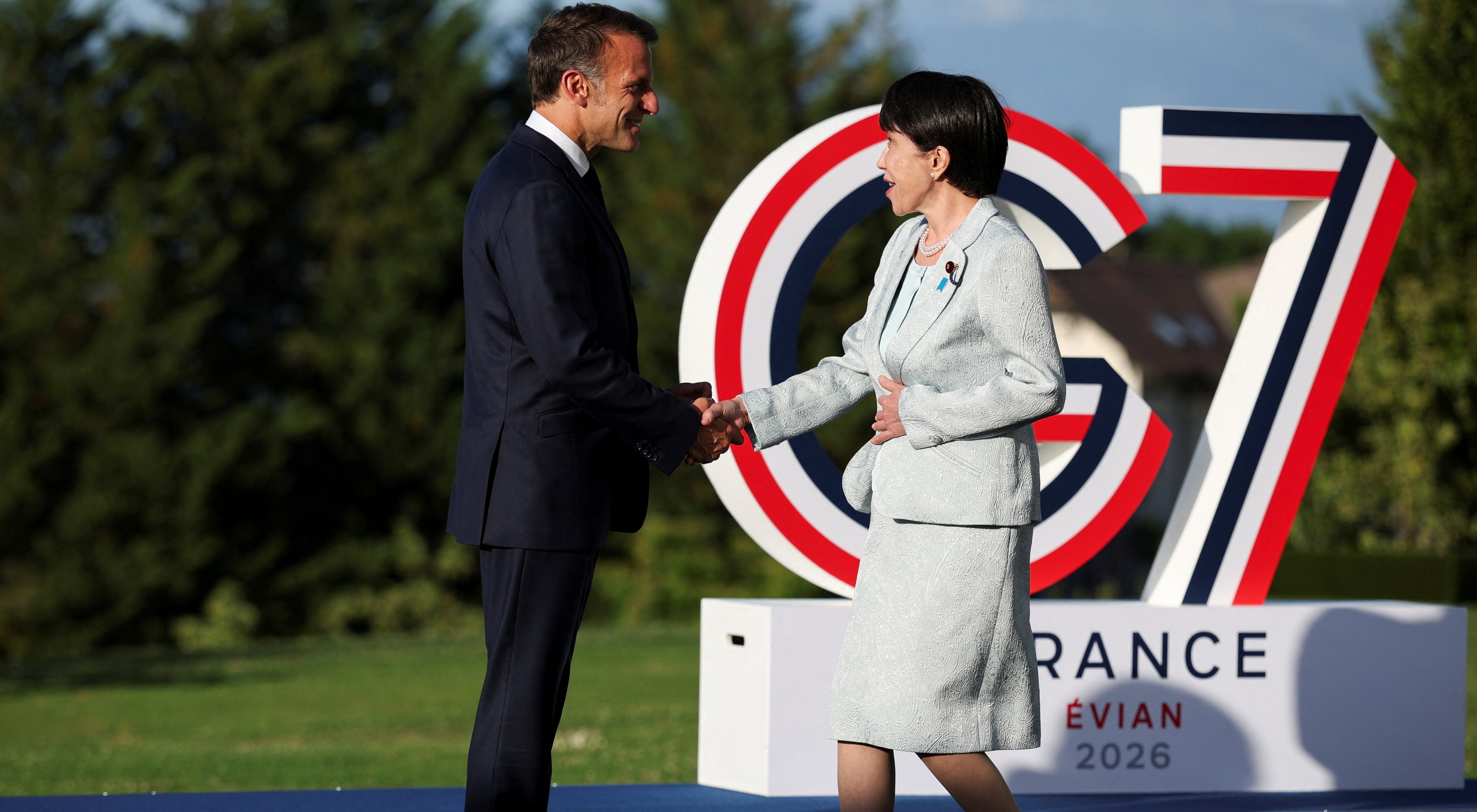 French President Emmanuel Macron shakes hands with Japanese Prime Minister Sanae Takaichi: As the G7 convened in Évian-les-Bains, leaders are being pressed to consider how to do more with less development assistance