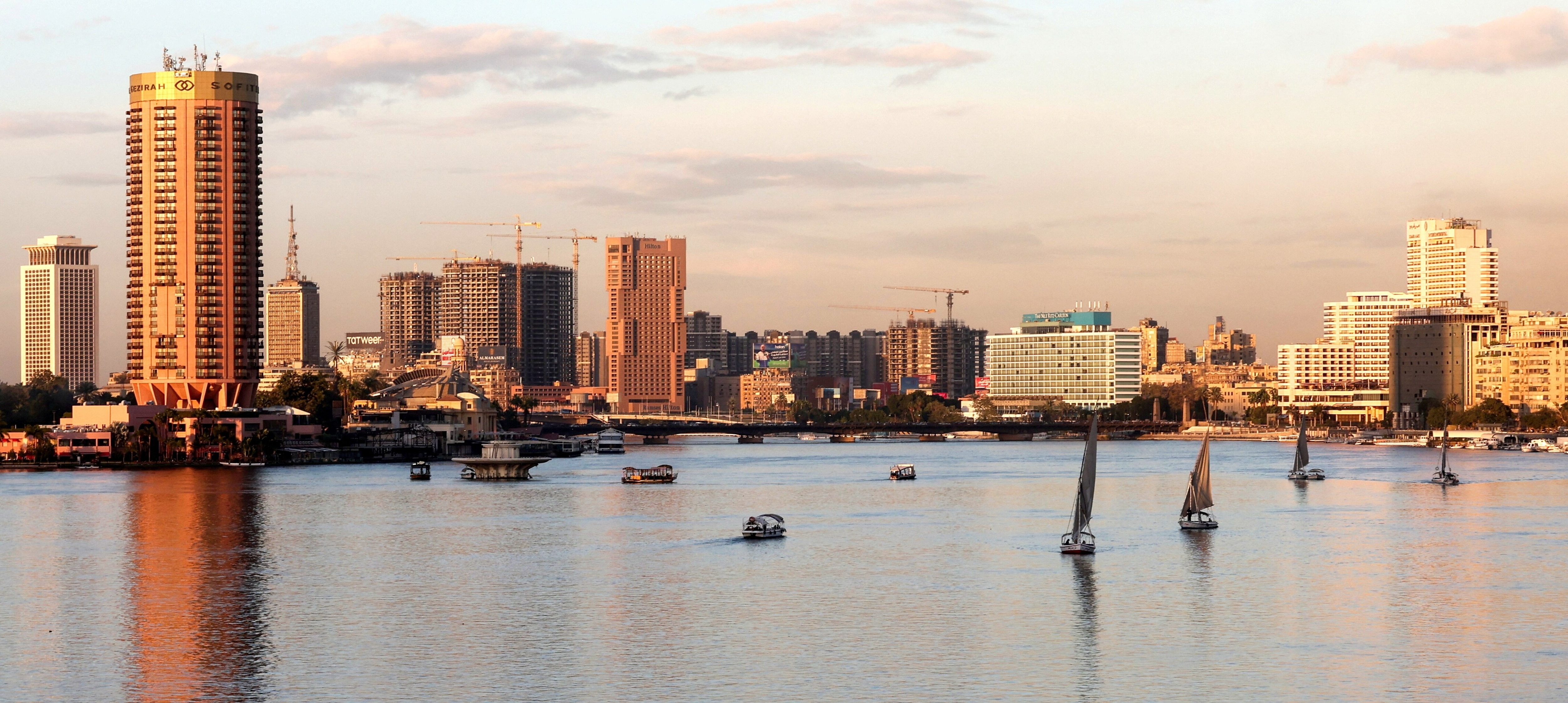 Boats sail on the Nile River in Cairo, Egypt, December 9, 2025. 