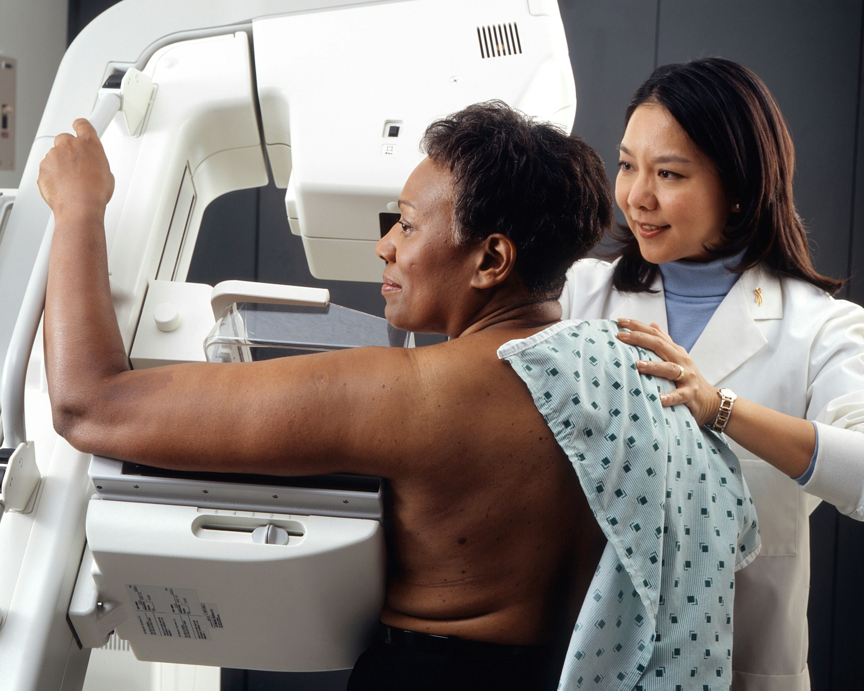 A woman being screened for breast cancer.