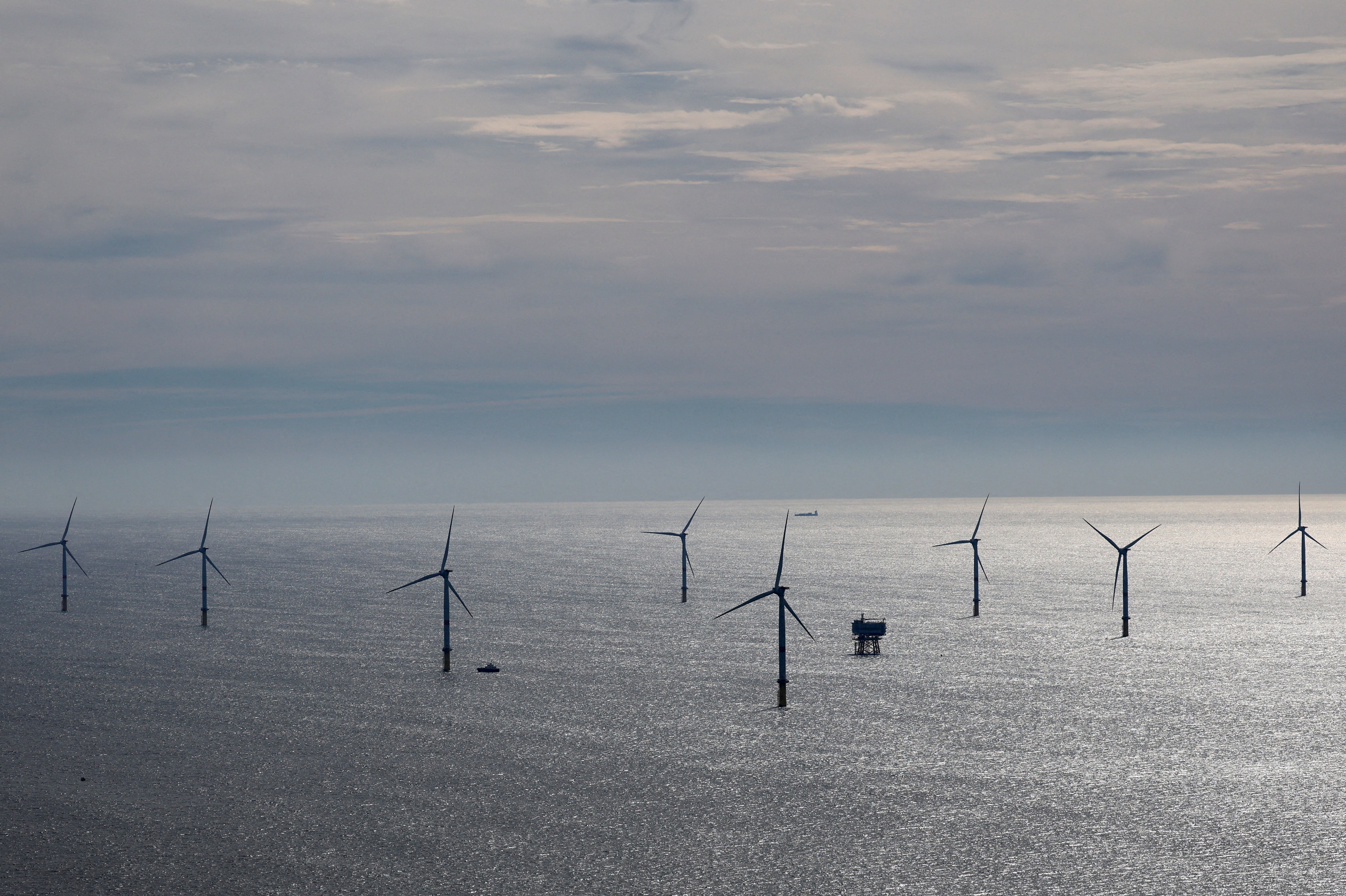 FILE PHOTO: An aerial view shows wind turbines at the Saint-Nazaire offshore wind farm, off the coast of the Guerande peninsula in western France, October 2, 2025. REUTERS/Stephane Mahe/File Photo