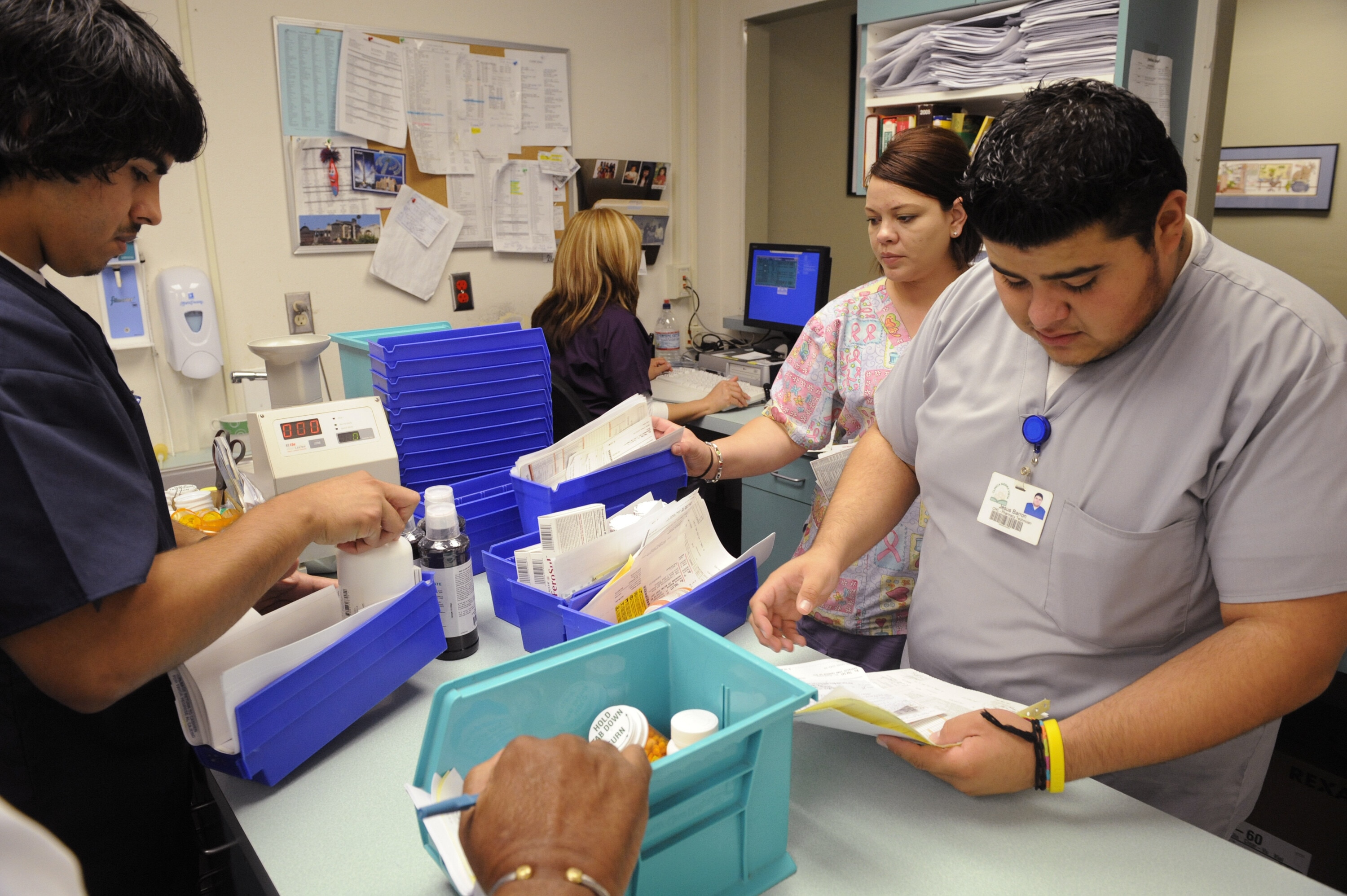 Pharmacy techs work in the pharmacy at Clinica Sierra Vista's Lamont Community Health center in Bakersfield, California October 20, 2009. Nowhere in the United States has more doctors at its beck and call than White Plains, one of the wealthiest cities in the nation. Nearly 3,000 miles (4,830 km) away, scaring up a doctor in Bakersfield, situated in California's economically battered Central Valley, is a lot harder. In fact, White Plains has more than twice the number of doctors per capita as Bakersfield, where needy patients until recently had to take a 2-hour bus trip to Fresno to see a diabetes treatment specialist. Picture taken October 20, 2009: Cyber resilience in the healthcare sector often comes out of a precarious balancing exercise of priorities