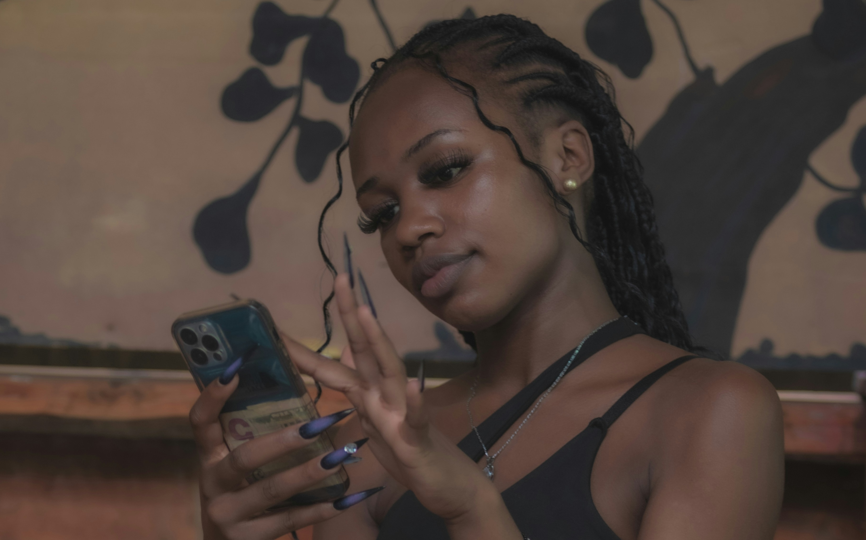 Woman scrlling through phone: Trust is critical for the discovery economy.