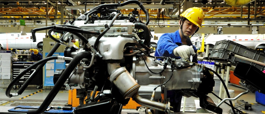 An employee works on an assembly line producing automobiles at a factory in Qingdao, Shandong Province, China, March 1, 2016. Activity in China's manufacturing sector shrank more sharply than expected in February, surveys showed on Tuesday, prompting smaller companies to shed workers at the fastest pace in seven years and suggesting Beijing will have to ramp up stimulus to avoid a deeper economic slowdown. REUTERS/Stringer ATTENTION EDITORS - THIS PICTURE WAS PROVIDED BY A THIRD PARTY. THIS PICTURE IS DISTRIBUTED EXACTLY AS RECEIVED BY REUTERS, AS A SERVICE TO CLIENTS. CHINA OUT. NO COMMERCIAL OR EDITORIAL SALES IN CHINA.       TPX IMAGES OF THE DAY      - GF10000328892