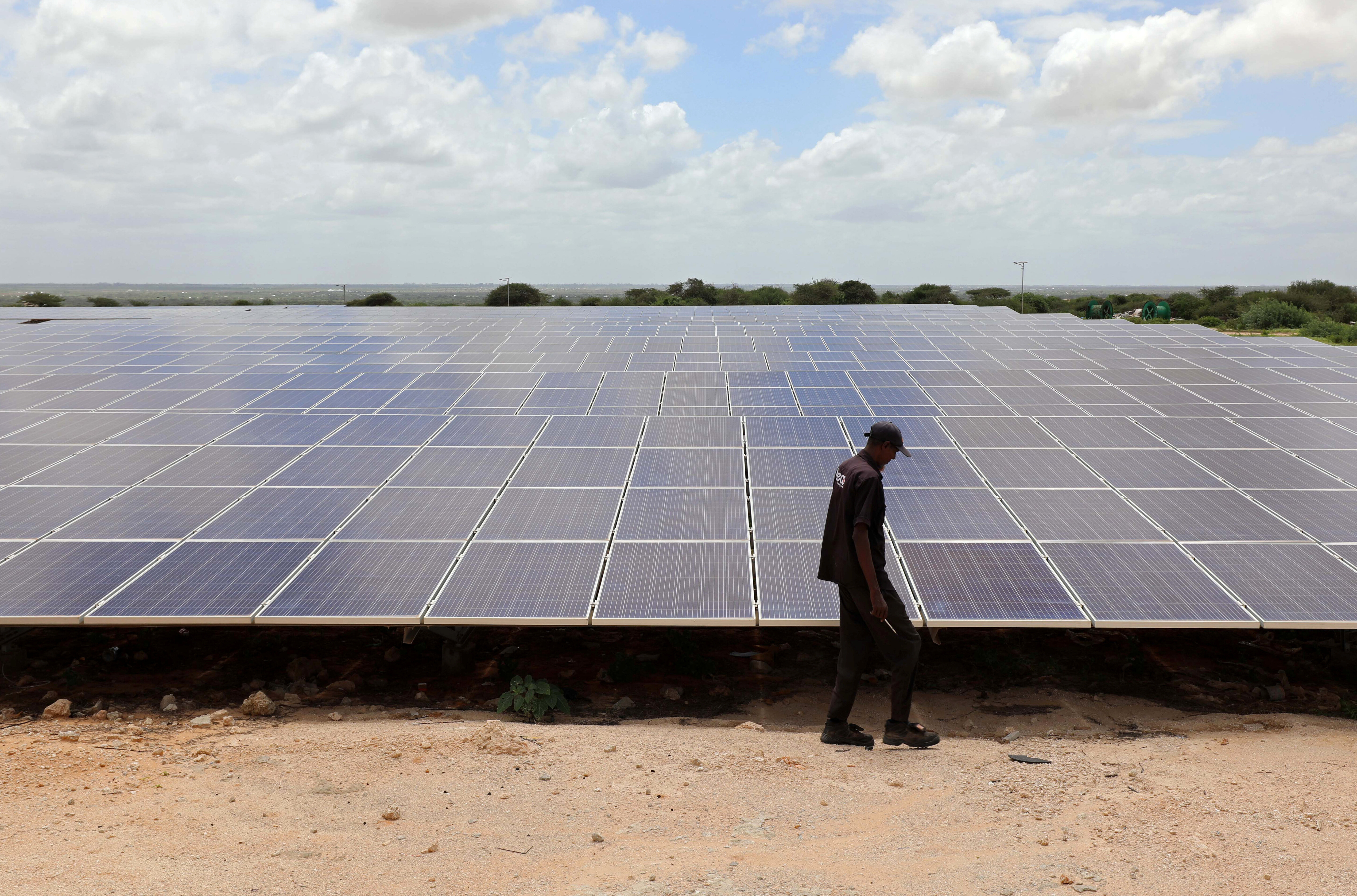 Renewable energy: A engineer walks past the solar panels at the Benadir Electricity Company (BECO) solar project in Mogadishu, Somalia May 21, 2020.