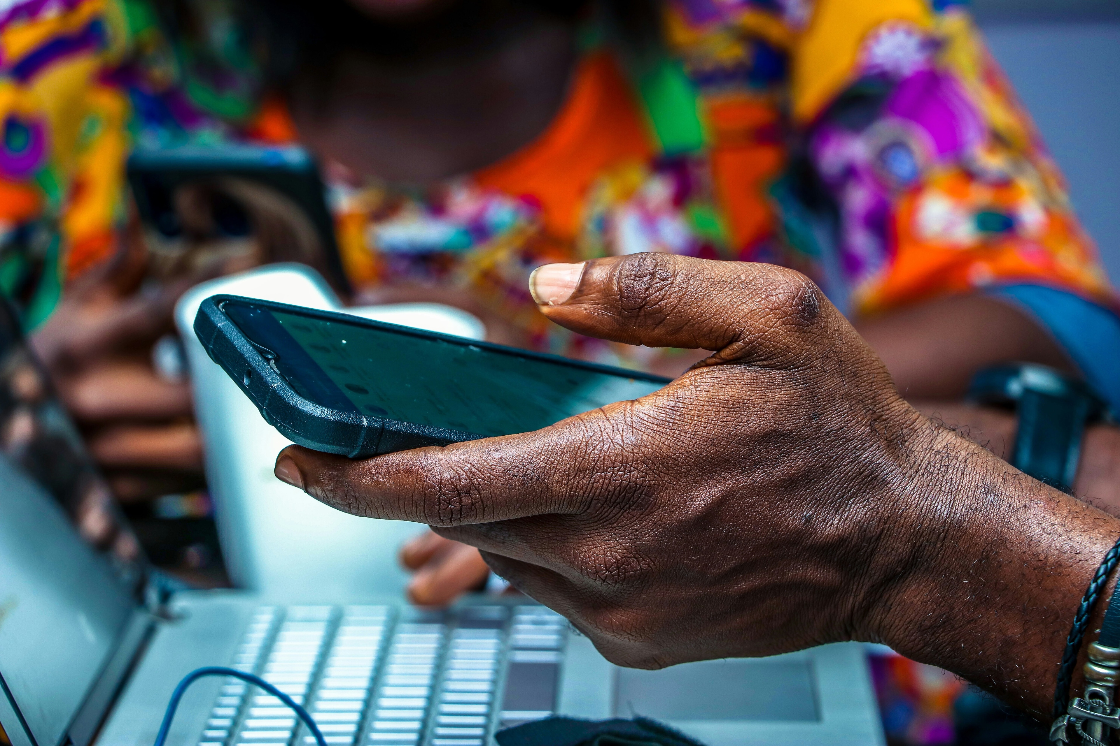 Illustrative photo of an individual searching the internet on their smartphone.
