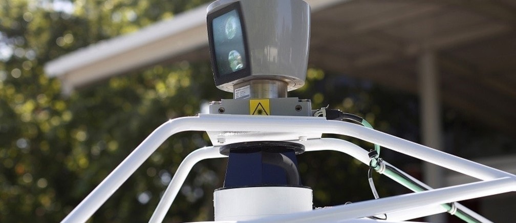 A sensor is seen spinning atop a Google self-driving vehicle before a presentation at the Computer History Museum in Mountain View, California May 13, 2014. REUTERS/Stephen Lam (UNITED STATES - Tags: SCIENCE TECHNOLOGY TRANSPORT) - RTR3OZBV