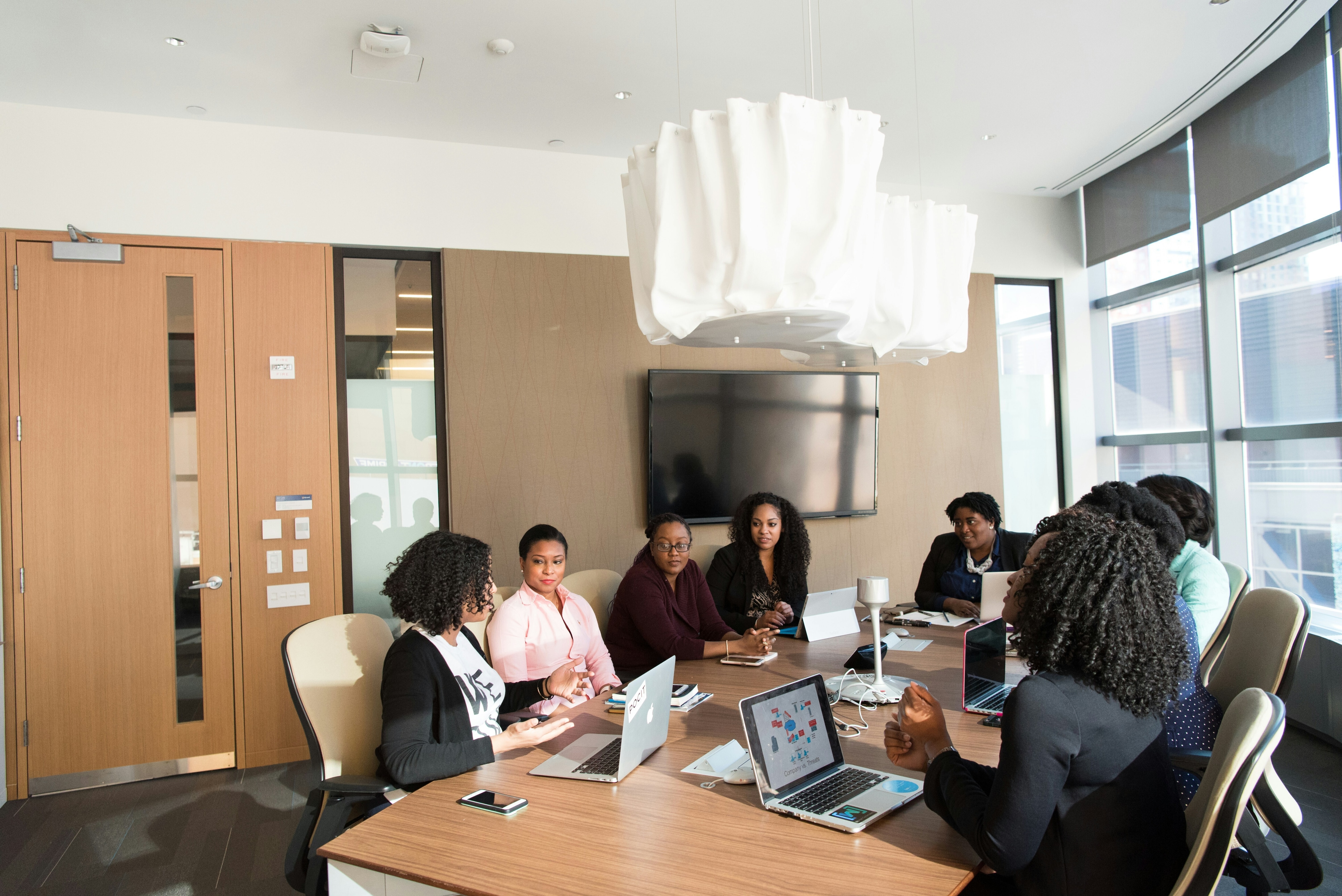 Women working around a table.