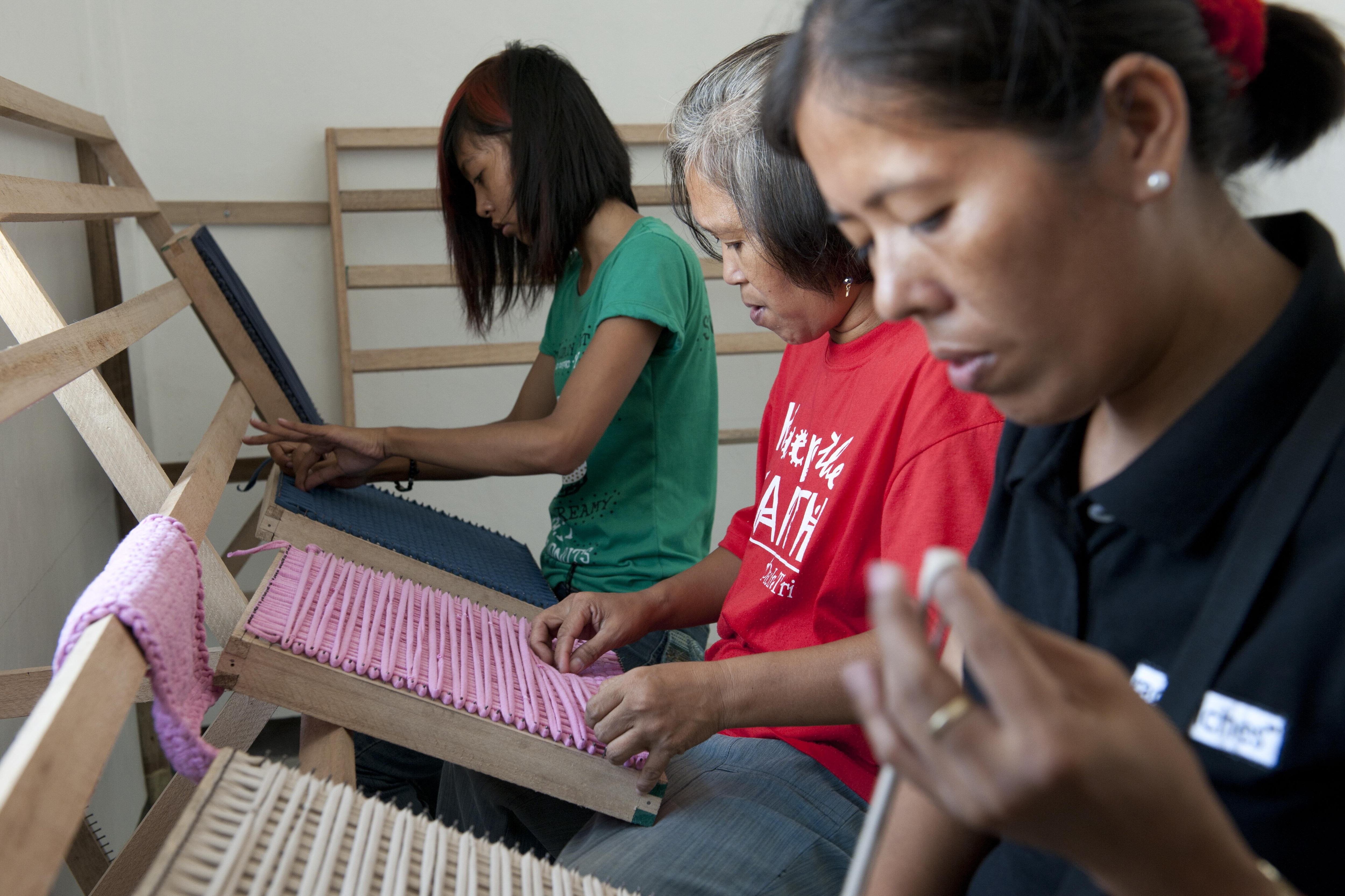 Weaving 'Mother' working at the 'Women Empowerment Center' in Payatas. Social innovation is providing businesses with a competitive edge.