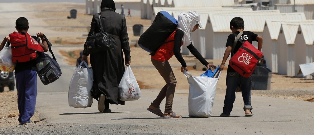 How can we solve the global refugee crisis?