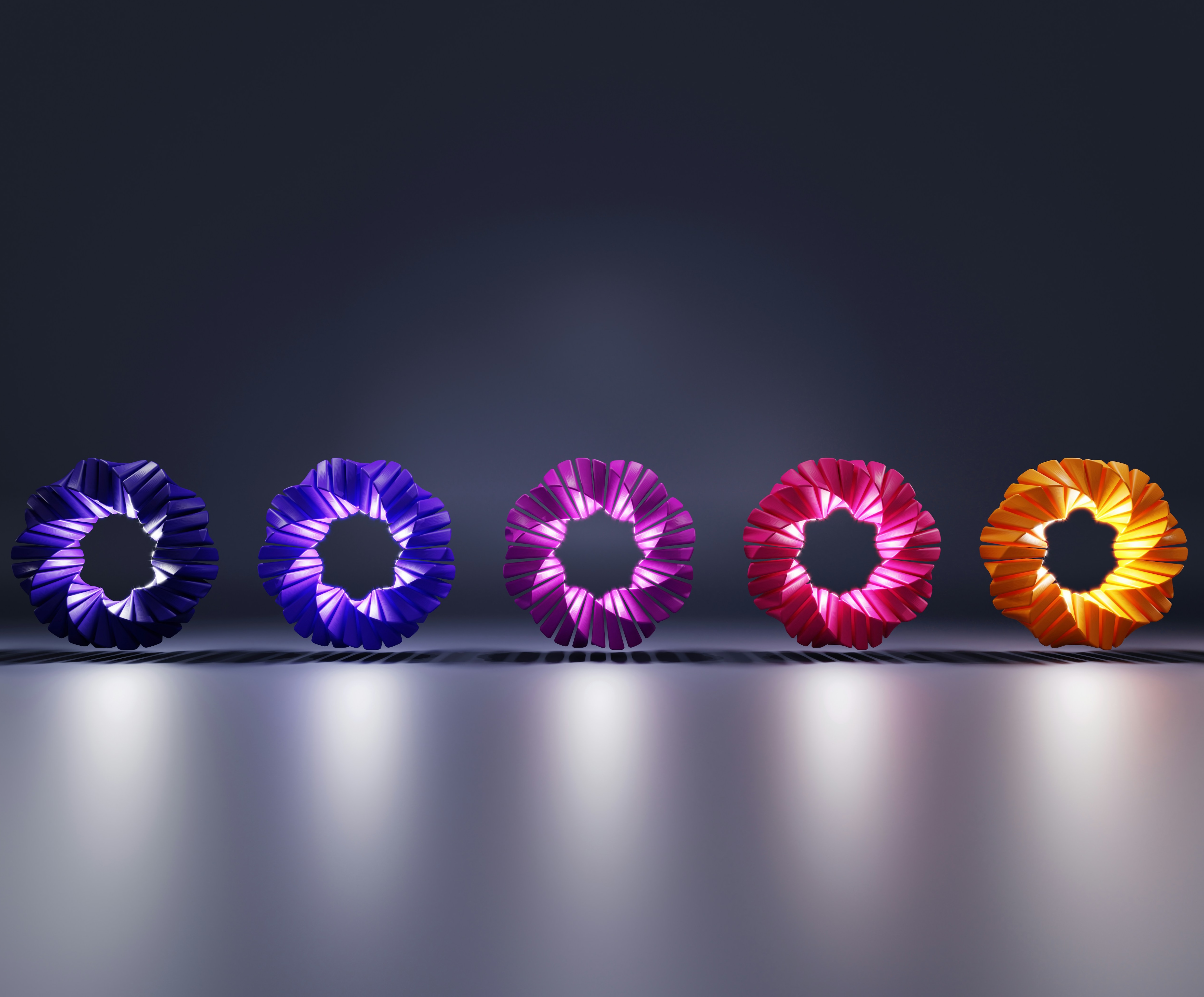 A row of colourful paper flowers on a balck background: Leaders can make strategic choices to turn well-being into a competitive advantage