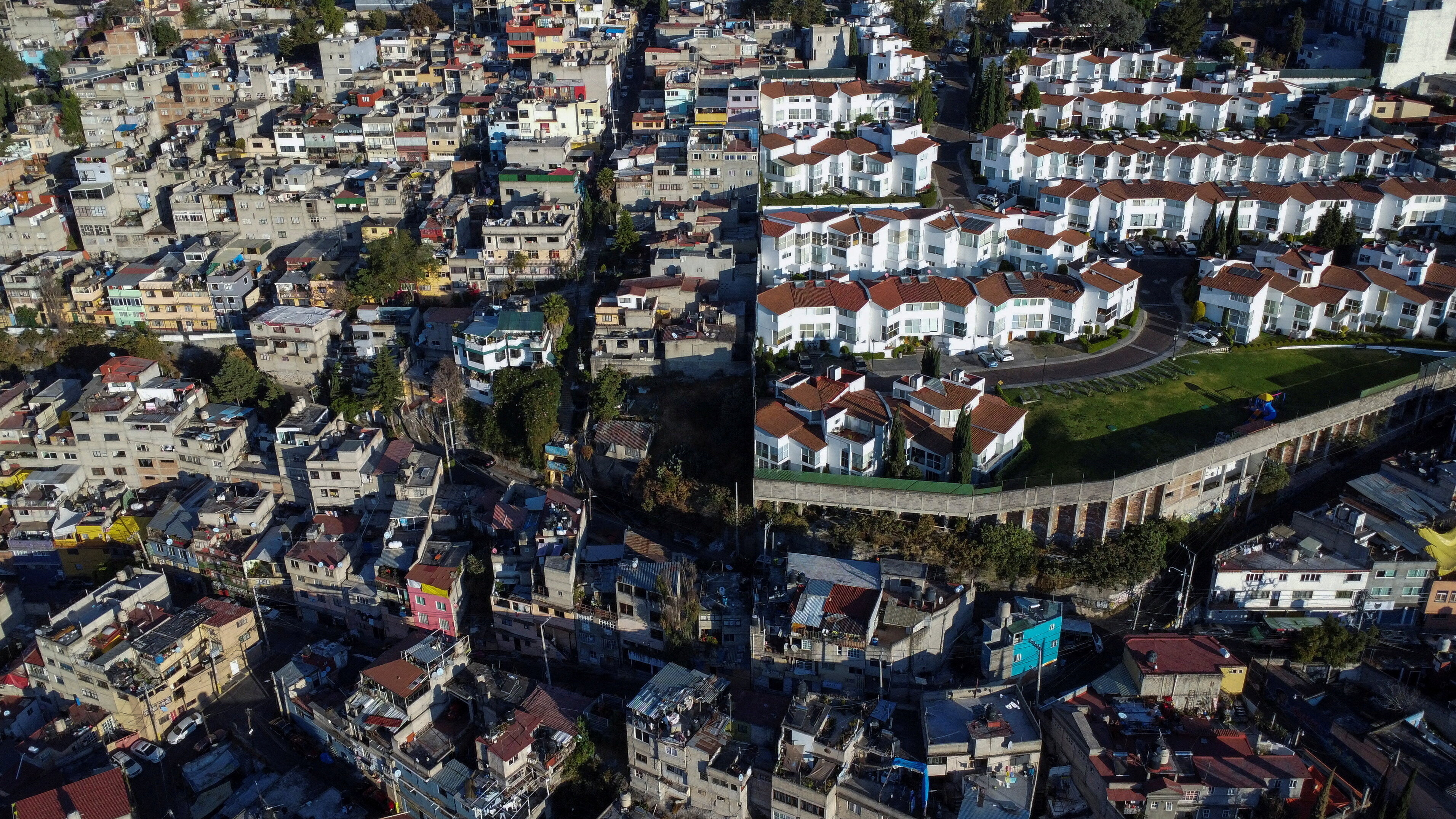 A drone view shows the stark contrast between neighborhoods in Santa Fe, highlighting deep social and economic inequality in Mexico City, Mexico January 7, 2026.